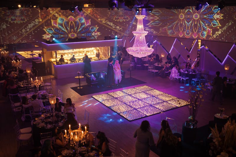 Private dining event with elegantly set tables and guests